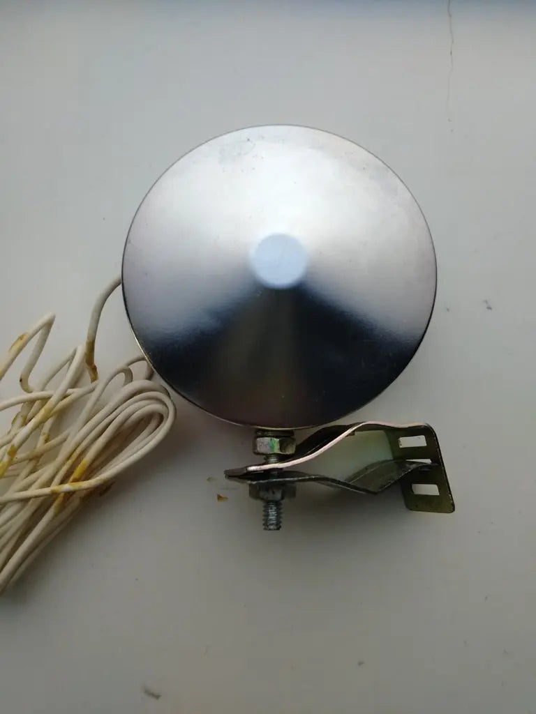 NOS vintage bicycle safety light bulb reflector packaged securely for global shipping.