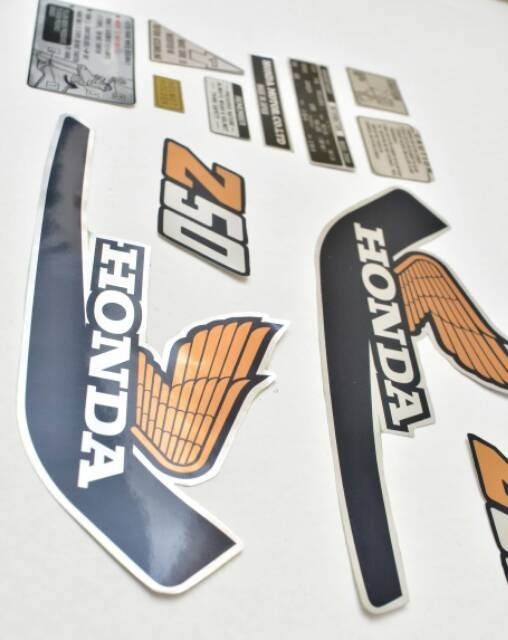 Sticker decal Honda dirt bike graphics Z50 1977 Side Cover Tank Picture from Side View – vintage_bike_store