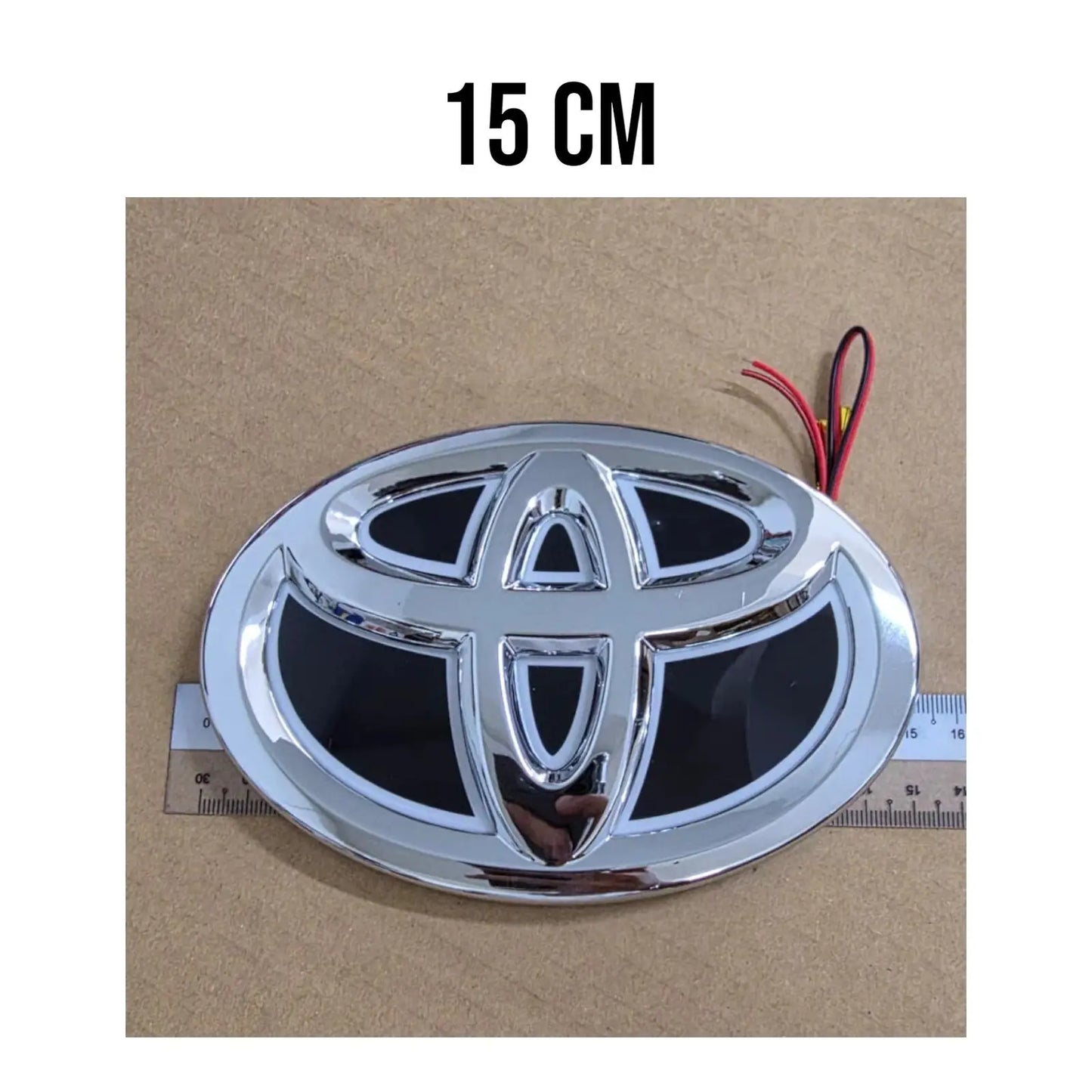 Individual blue LED Toyota rear emblem unit safely packaged for worldwide delivery.