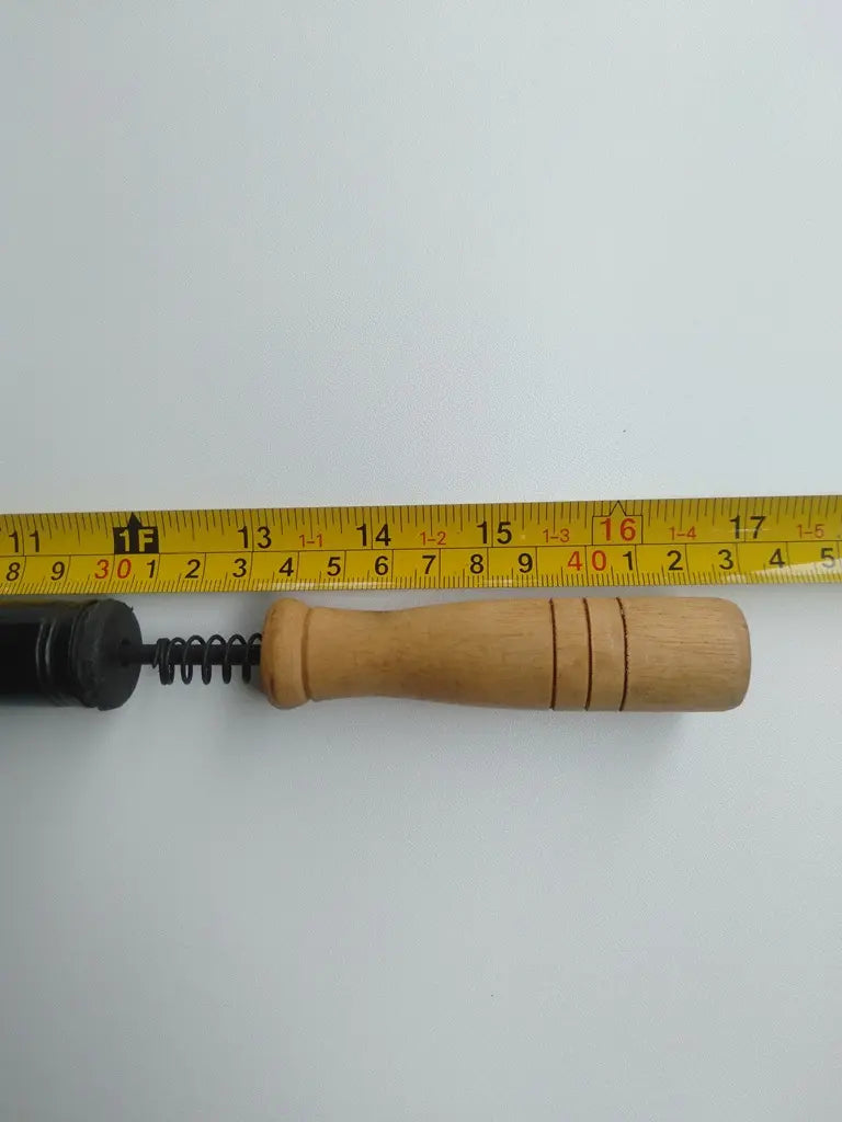 English valve vintage bicycle pump with authentic wooden handle detail
