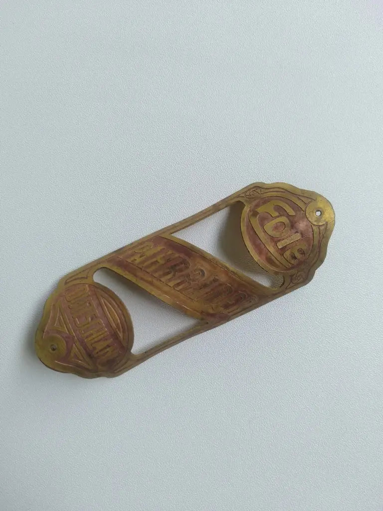 Handmade Pahrrader brass bicycle head badge right view
