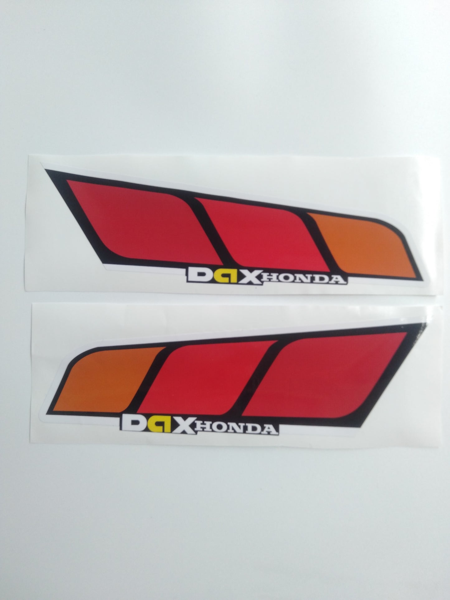 Left and Right Dax Honda decal stickers on a white background