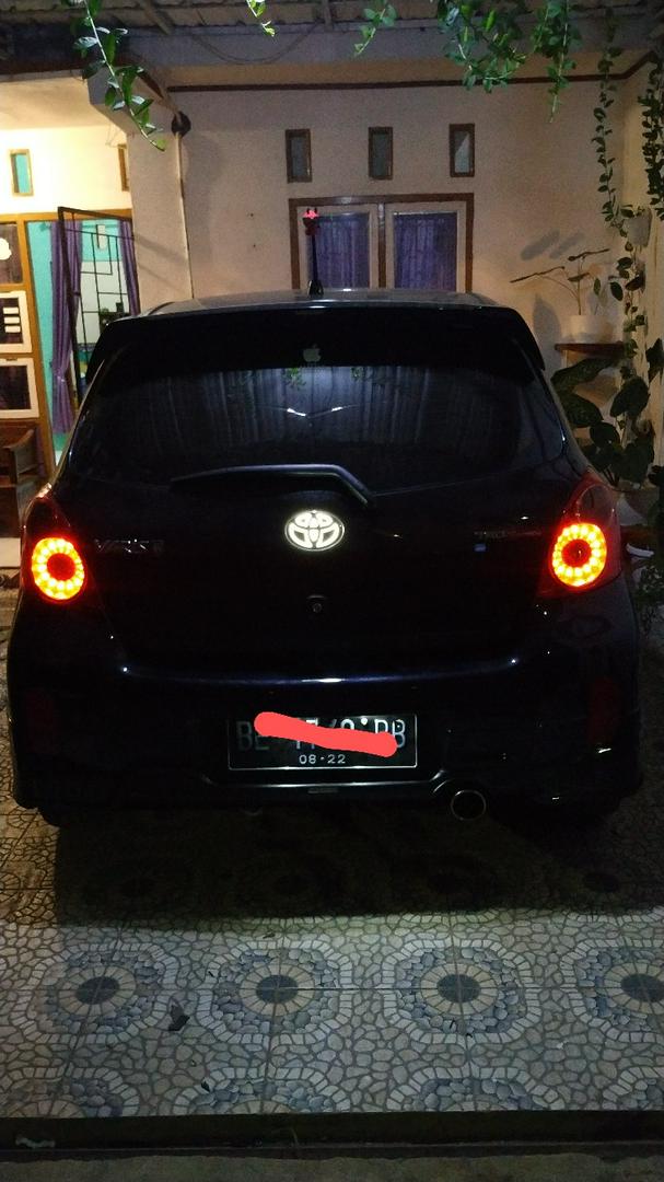 Rear Emblem White LED Toyota Yaris parked indoors, with the LED illuminated
