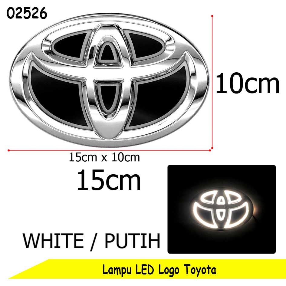 Toyota emblem LED light product image showing a chrome silver oval badge with black center details, dimension markings of 15cm x 10cm, white illuminated view, and text reading 'WHITE' and 'Lamp LED Logo Toyota'.