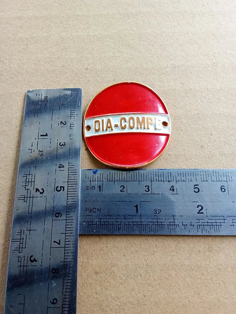 Vintage aluminum DIA COMPE bicycle head badge for restoration projects