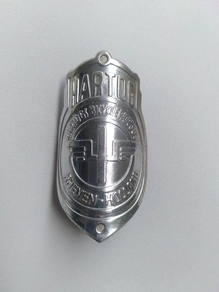 HARTOG silver aluminum head badge emblem for Hartog vintage bicycle NOS