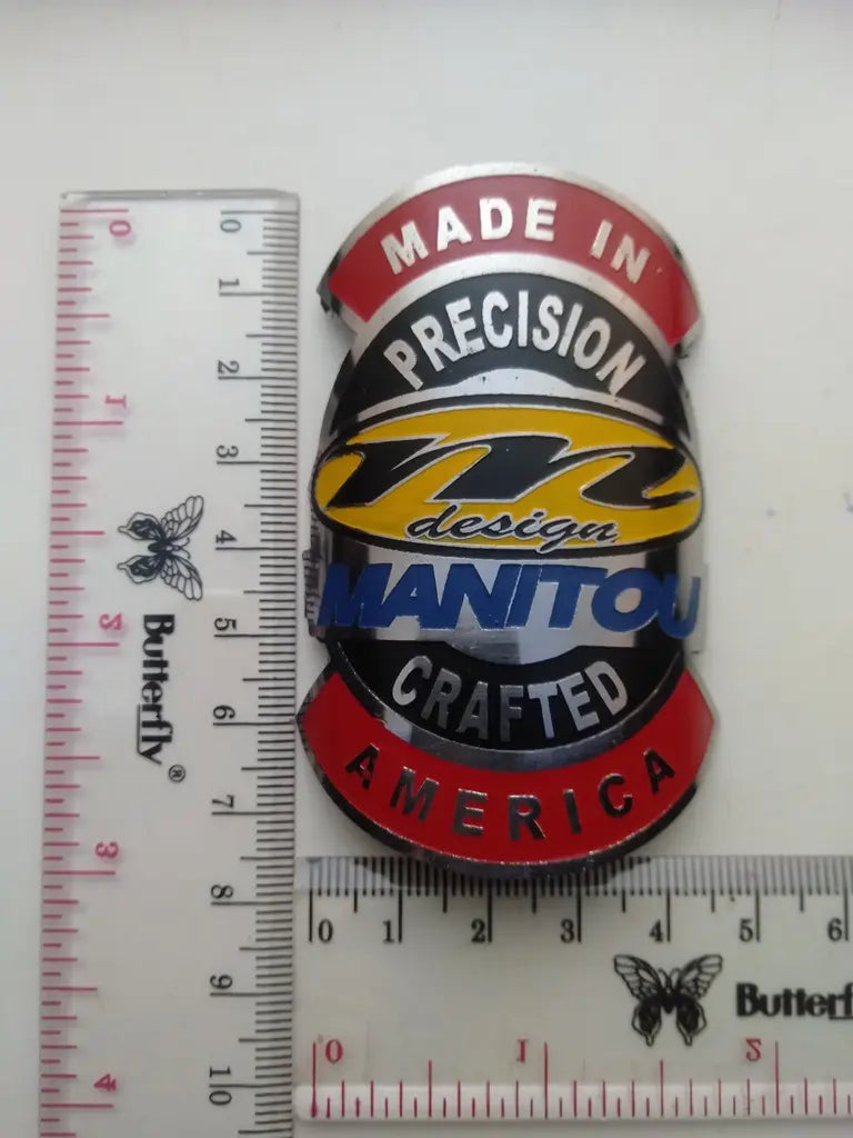 Flat profile Manitou bicycle stainless steel head badge