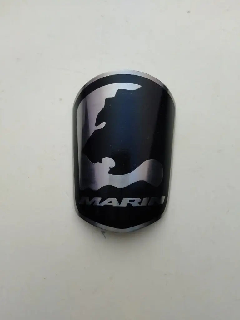 Marin black and silver bicycle head badge emblem in etched handmade stainless steel reproduction.