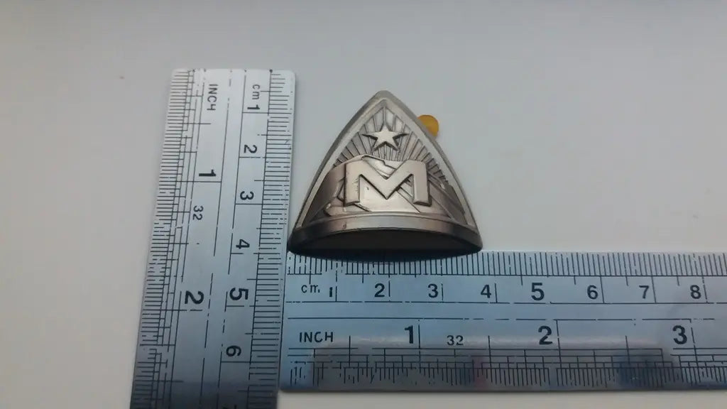 Measurement guide showing height and width dimensions of the NOS Marin triangle badge.