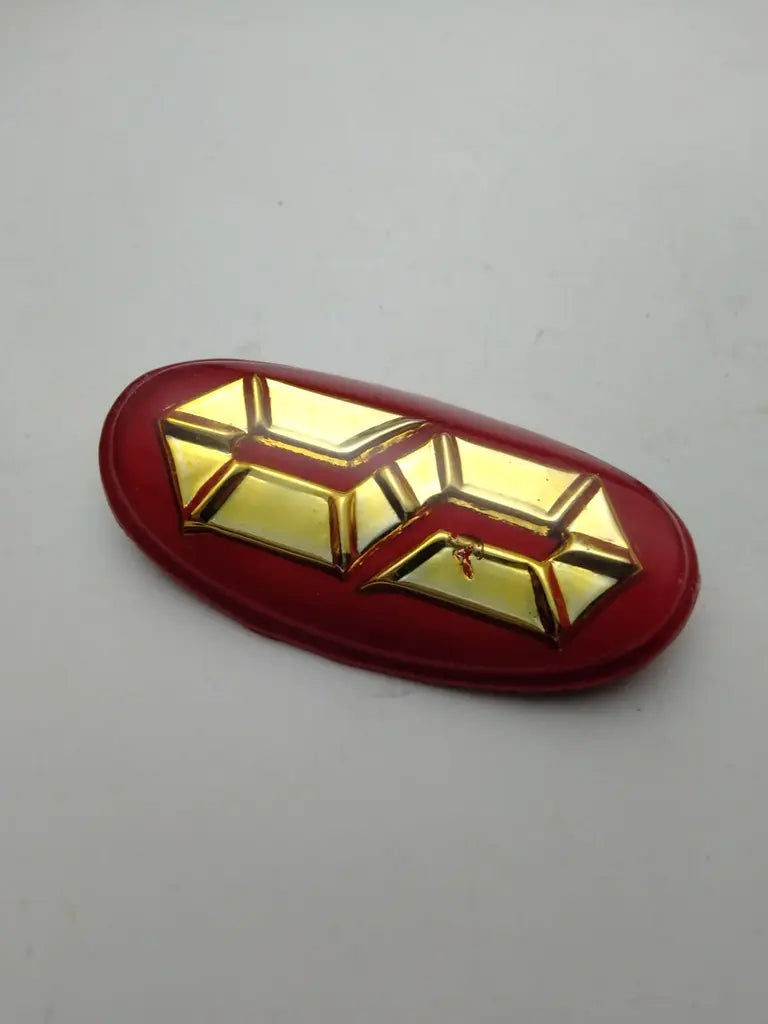 Sanki red and gold bicycle head badge emblem