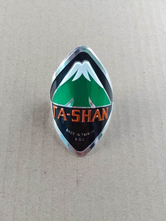 Ta-Shan logo on a textured surface