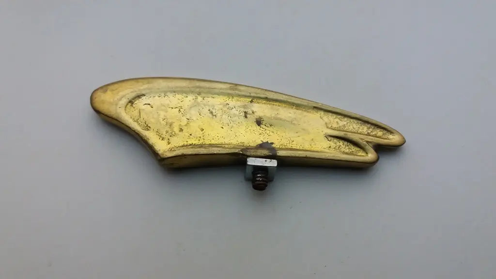 Wing Brass Apollo ornament front mudguard emblem badge NOS